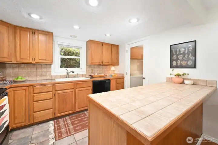 Spacious kitchen offers room to create and ample storage.