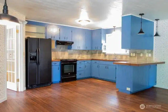 Kitchen is easy to maintain and lots of space for movement in  dining area
