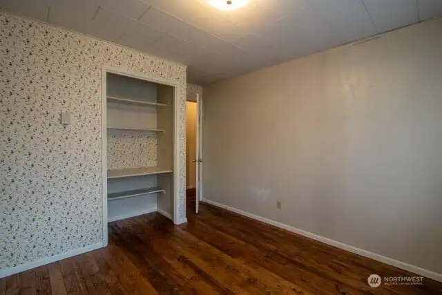 bedroom 3 of 5 (this has closet door) was used for a sewing room recently