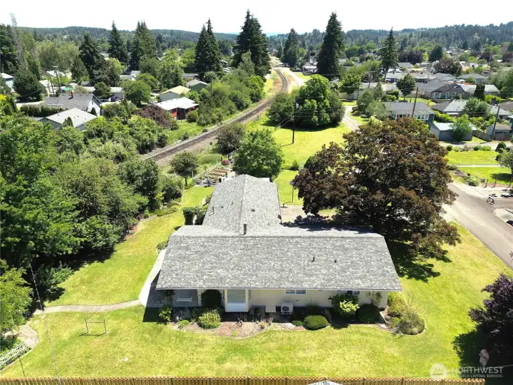 Aerial View of roof (2021 replaced) and beautiful yard! Cottage to far Left Corner