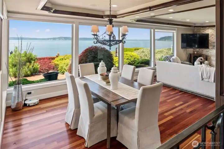 Every meal comes with a view here — the dining room's wraparound windows frame the Sound and Olympic Mountains beyond. Every meal comes with a view here — the dining room's wraparound windows frame the Sound and Olympic Mountains beyond.