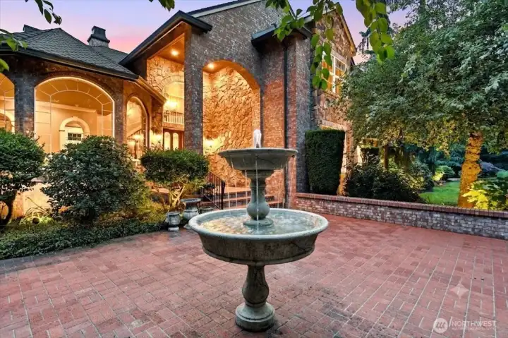 Brick patio, fountain, front entry, covered brick patio Brick patio, fountain, front entry, covered brick patio