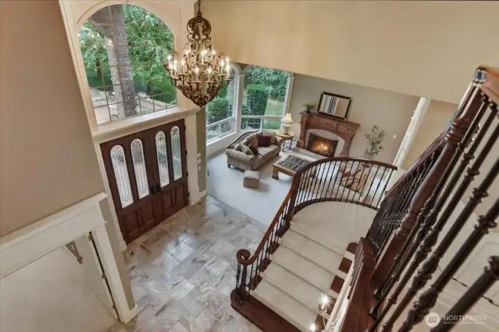 Front entrance, chandelier, tile floor, living room, fireplace, high ceilings Front entrance, chandelier, tile floor, living room, fireplace, high ceilings