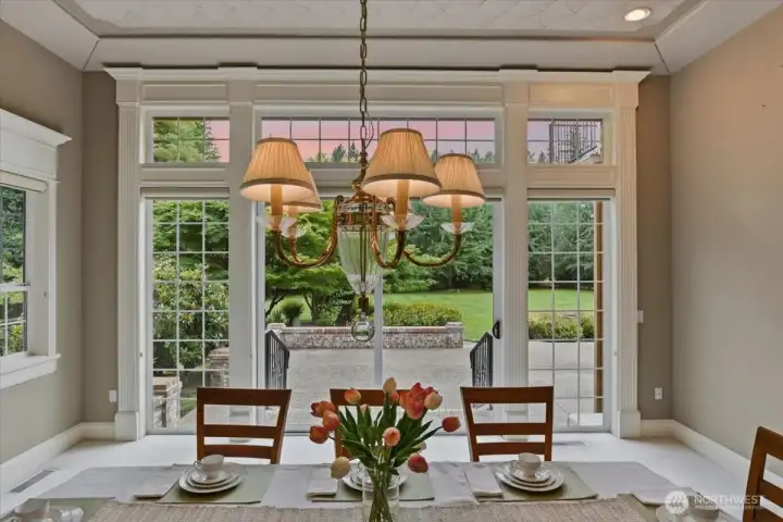 Formal dining room, w2w carpet, floor-to-ceiling windows, high ceilings, custom trim & casings Formal dining room, w2w carpet, floor-to-ceiling windows, high ceilings, custom trim & casings