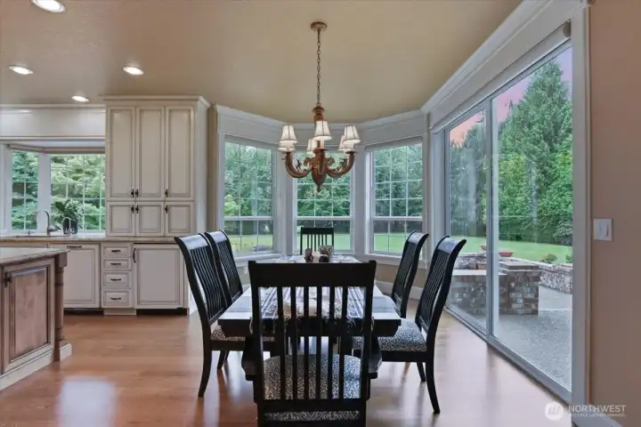 Dining nook, hardwood floors, patio access, sliding door, floor-to-ceiling windows, high ceilings Dining nook, hardwood floors, patio access, sliding door, floor-to-ceiling windows, high ceilings