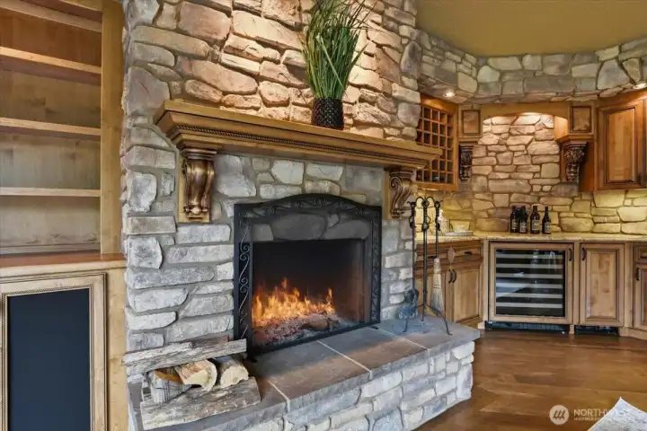 Lodge-style family room, fireplace, hardwood floors, wine storage, built-in shelves, wired for sound Lodge-style family room, fireplace, hardwood floors, wine storage, built-in shelves, wired for sound
