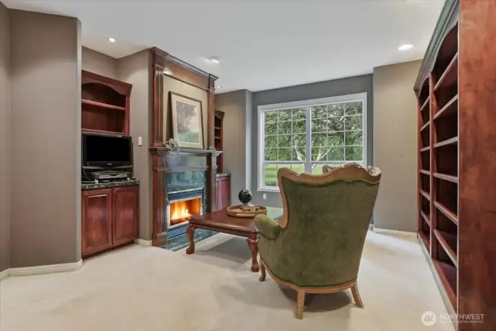 Office/den, w2w carpet, built-in shelves, fireplace Office/den, w2w carpet, built-in shelves, fireplace