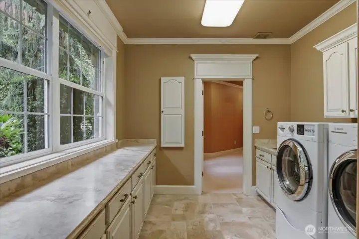 Laundry on main, garage access, sink, extra storage, granite, windows, tile Laundry on main, garage access, sink, extra storage, granite, windows, tile