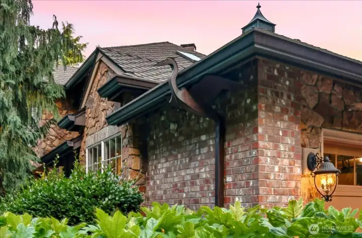 Custom copper gutters & downspouts, leafguards, brick exterior, landscaping Custom copper gutters & downspouts, leafguards, brick exterior, landscaping