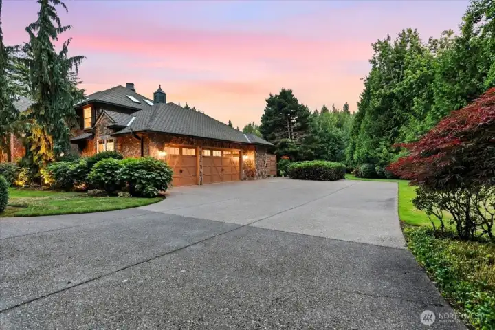 Driveway, RV parking, 3-car garage, meticulous landscaping Driveway, RV parking, 3-car garage, meticulous landscaping