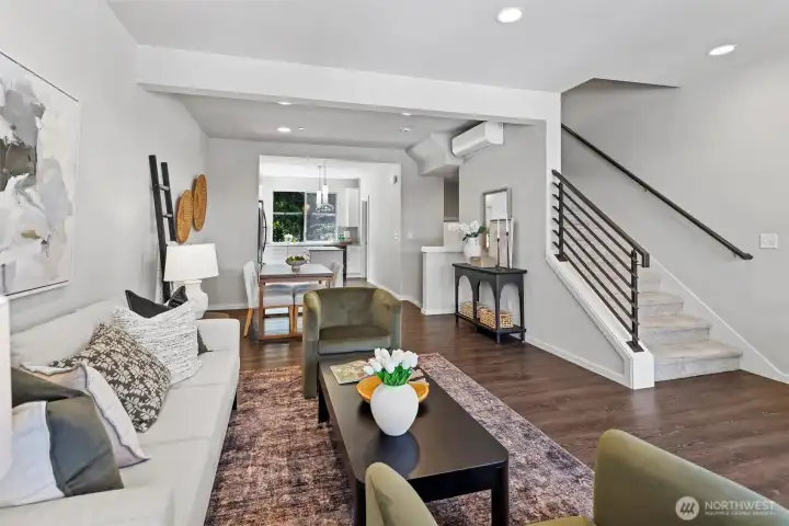 Open-concept living spaces create seamless flow for entertaining, relaxing, and working from home. Open-concept living spaces create seamless flow for entertaining, relaxing, and working from home.