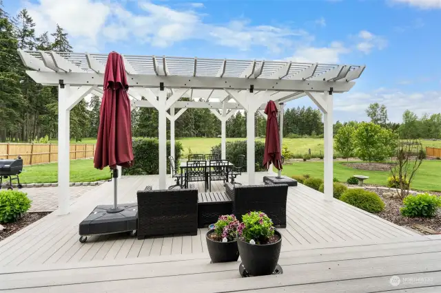 Pergola covers the expansive trex deck. Soak up nature from the comfort of your back yard.