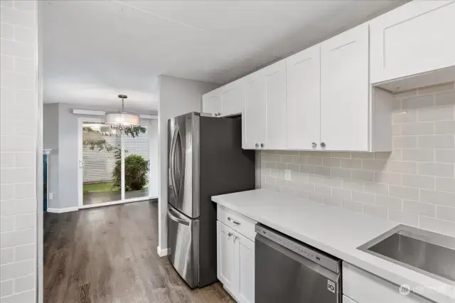 Quartz Countertops and Beautiful Tile Backsplash