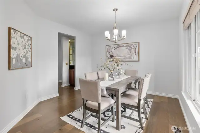 Butler's pantry off the kitchen leads to this formal dining room.