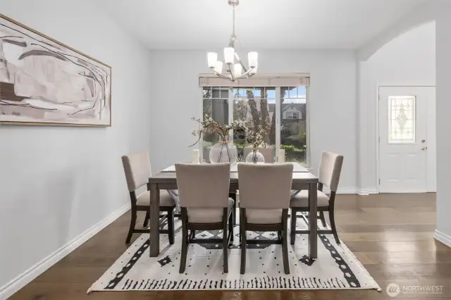Another angle of the formal dining room showing the entry to the right.