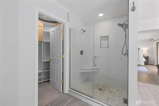 Spacious shower.  Walk-in closet goes back around to the left and has tons of room for all your clothes.