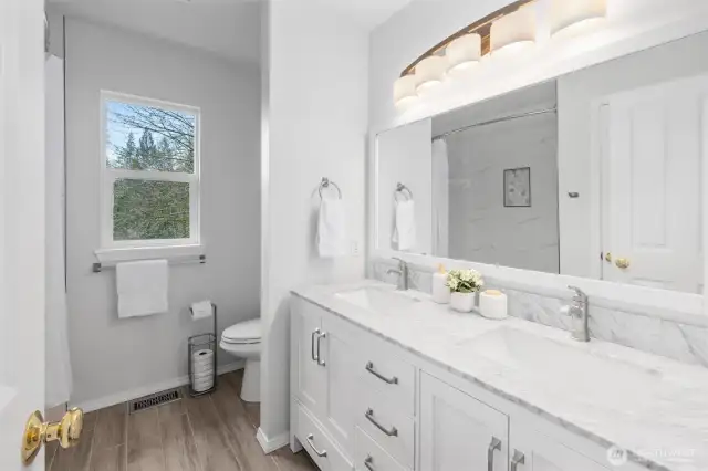 Remodeled full bathroom on the top floor.