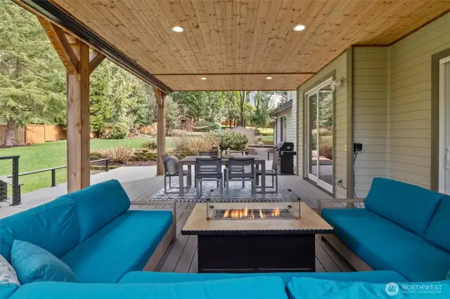 Expansive deck with large covered area is great for entertaining year round.