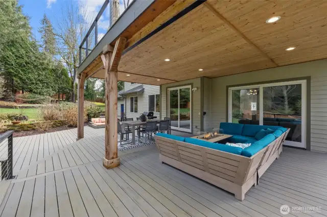 Notice the high-end decking and railing for low maintenance.