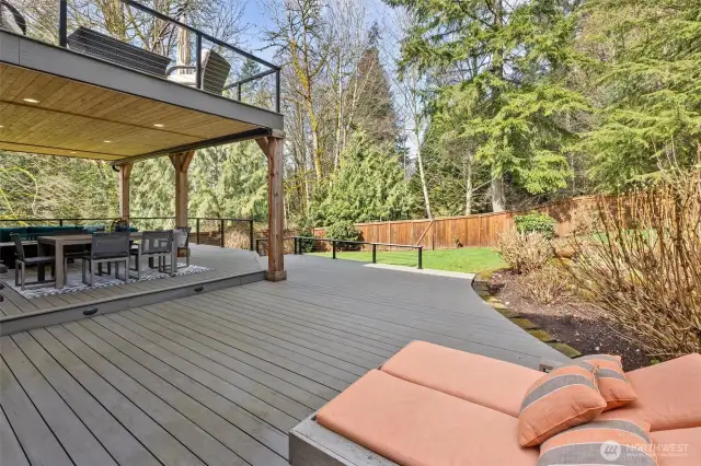 Additional uncovered deck area with easy access to the lawn.