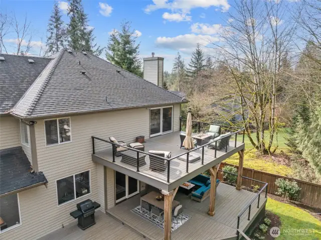 Second story deck is accessed from the primary bedroom.
