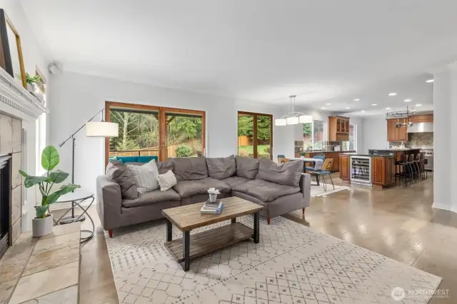 Home is wired for surround sound with speakers in living room, kitchen, covered deck area, and primary bedroom.