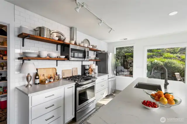 Stainless Steel Appliances and gas range.