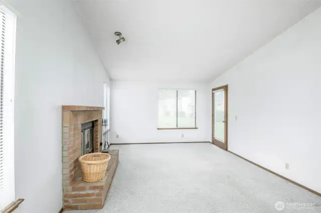 Access to the back patio from the naturally-lit living room