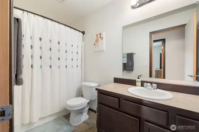 Main bathroom with large tub.
