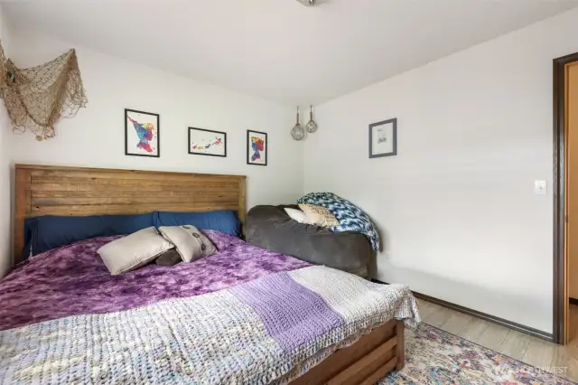 Generous third bedroom with closet built ins and a secret door leading to bedroom #2s closet.  The kids really loved the little secret door.