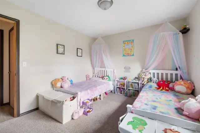Nice size second bedroom, closet has great built ins to help you stay organized.  There is a small door inside the closet that leads to the third bedroom.