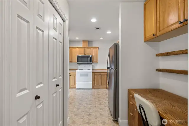 Utility closet and office space off the entry and kitchen.