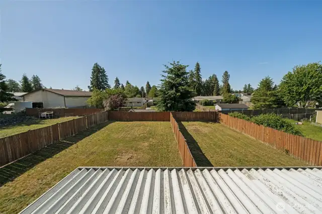 View from 2nd bedroom of unit 234. Each unit has a separate fully fenced backyard.
