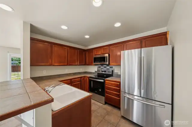 Kitchen of unit 234. New stove/range.