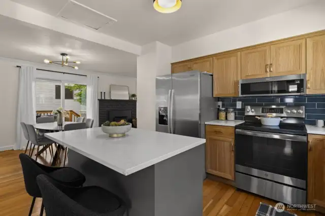 Quartz countertops and Custom hickory cabinets