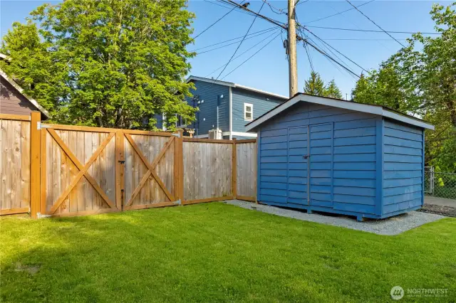 Large fully fenced lot, also has a shed for outside tools