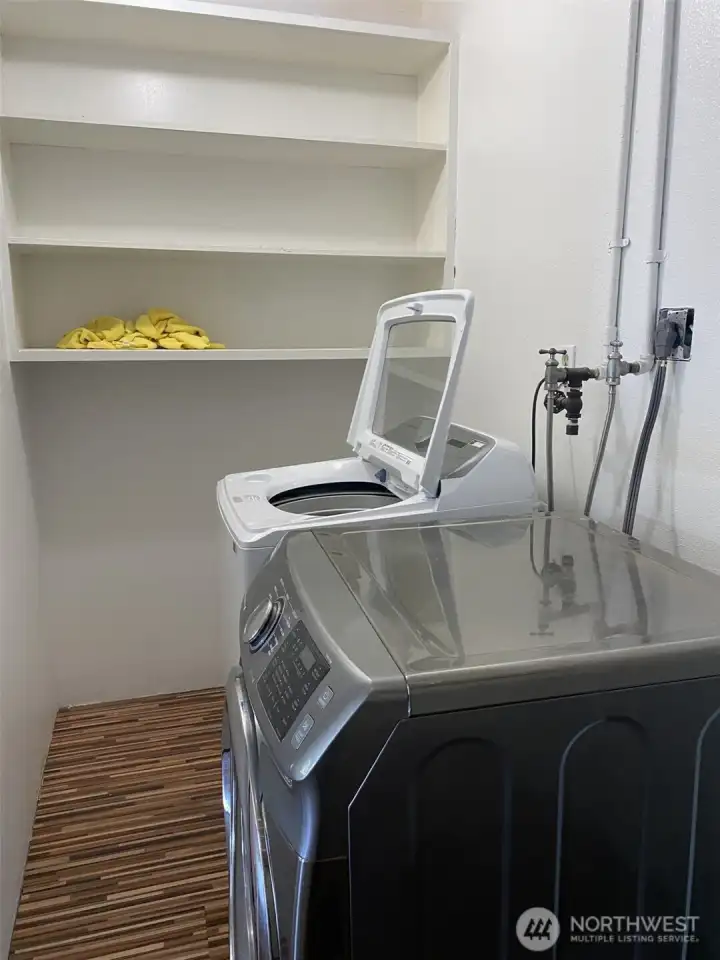 laundry room shelving and storage on the right side!