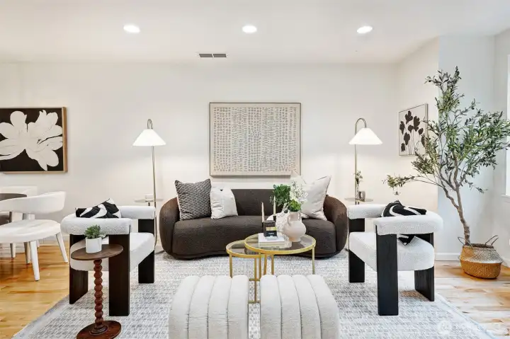 Enter in on the main level. New hickory floors, fresh paint. This home is turnkey and full of charm!