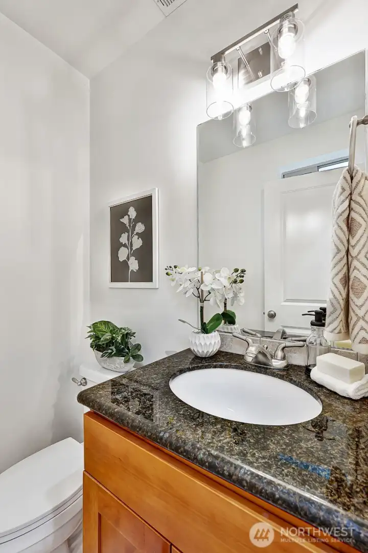 Powder room conveniently located on the main level
