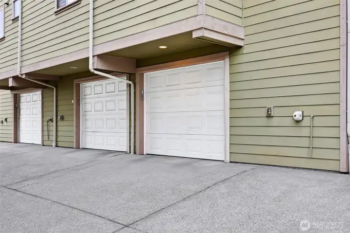 Garage parking with space for additional storage. Garage enters into Lower level.