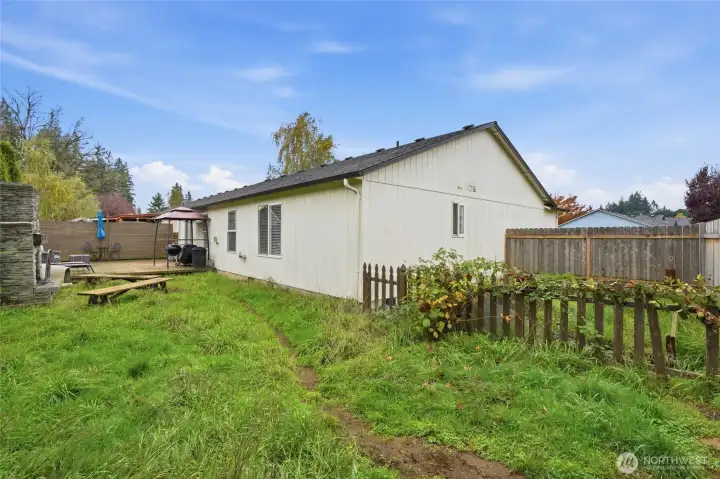 Backyard with fenced garden space