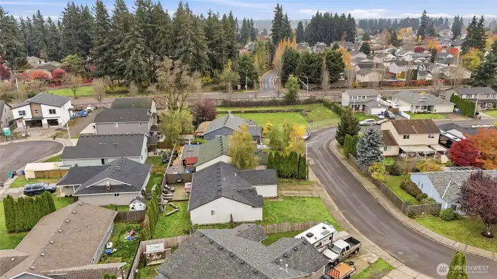 Aerial neighborhood view-side of property