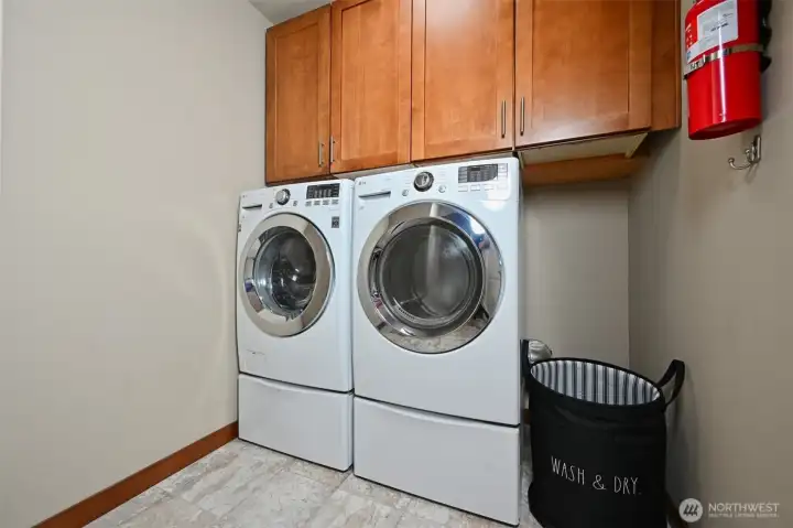 Laundry room on the main floor.  Washer and dryer stay!