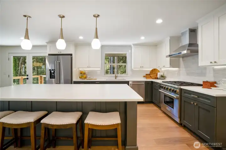 All new brushed gold led lighting and Lava finish countertops