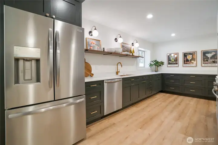 Lower level kitchen w/restoration hardware lighting and tons of cabinet space