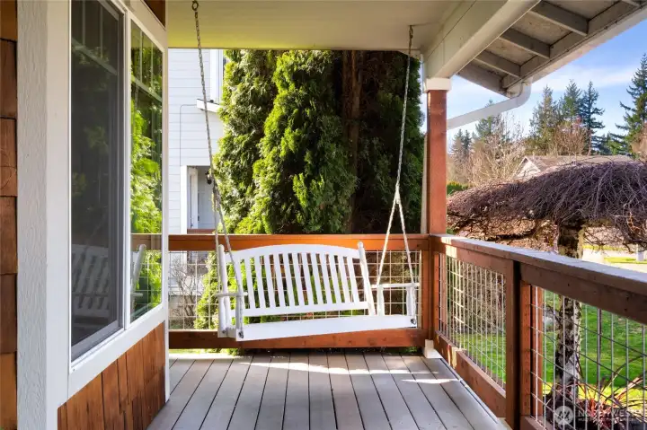 Enjoy your morning coffee from the porch swing on the covered front porch.