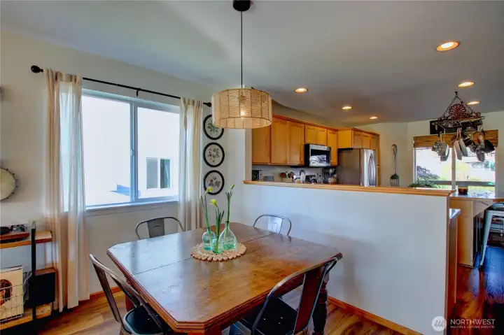 Dining area. Notice the new lighting fixtures throughout the home.