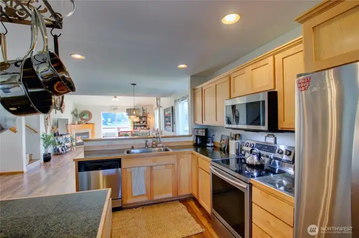 Maple cabinets and tiled granite counters.