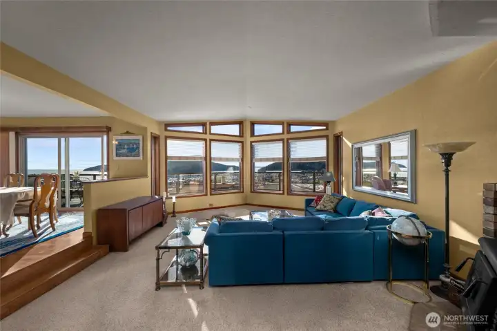 Step into these panoramic water, island and mountain views...  (some furniture removed from this photo)