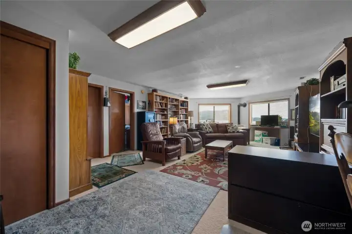 Great room with storage and 2 bedrooms to the left...